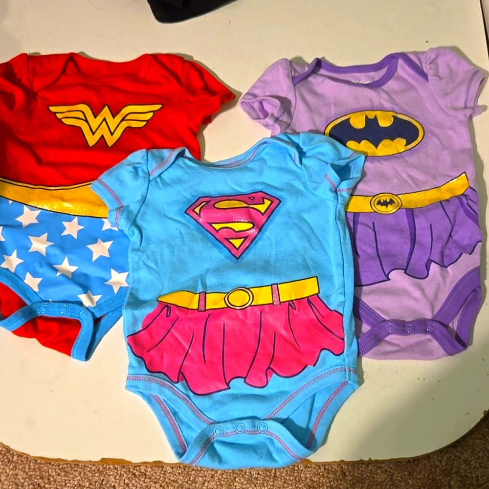 DC comics girls, baby 3-6 mo superhero onsies.